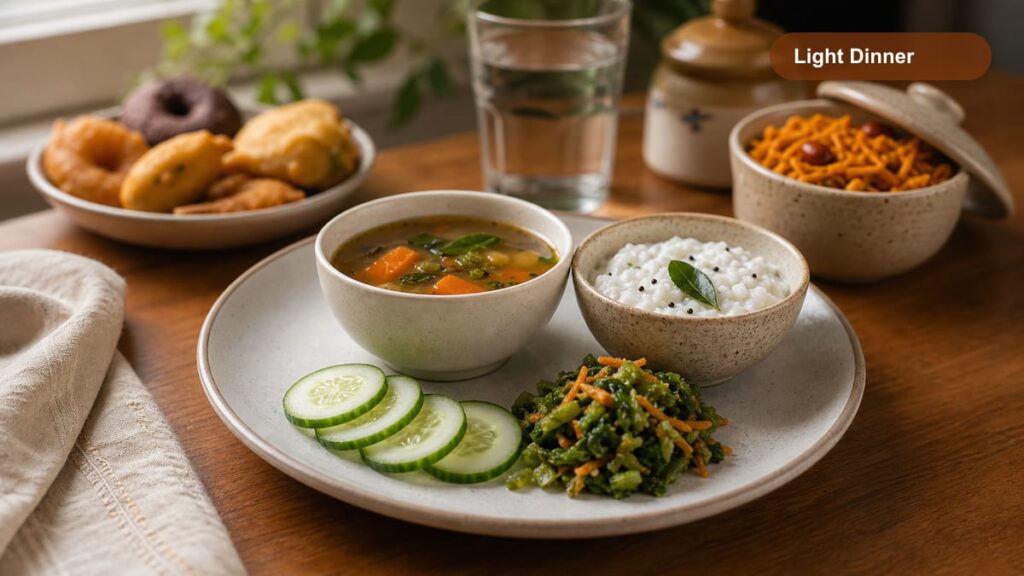 Light dinner plate with soup, rice, vegetables, and cucumber slices